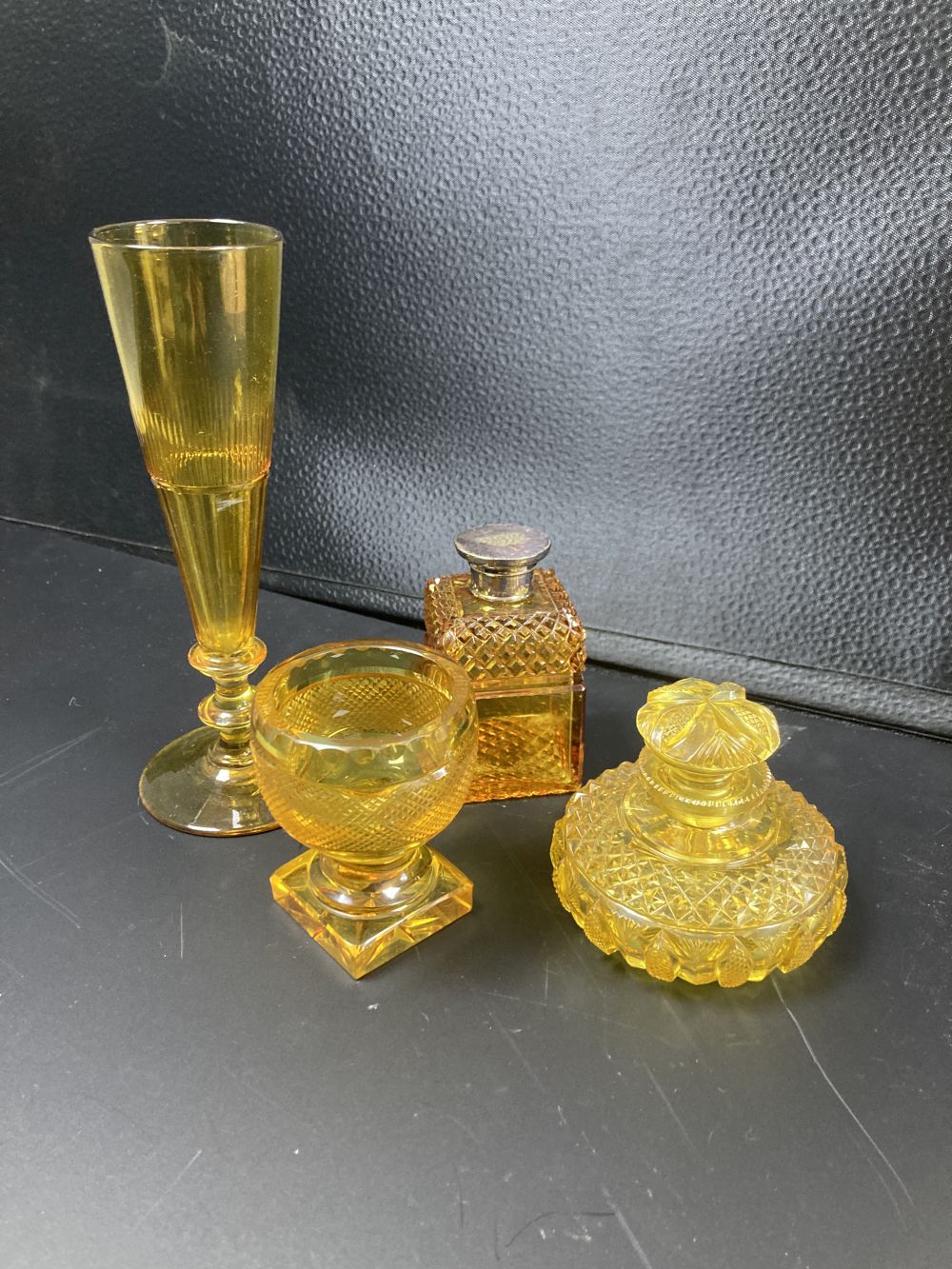 Four items of cut amber glass, 19th / 20th century,